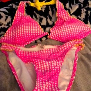 Bikini bathing suit. Top is a medium and bottom is a small.